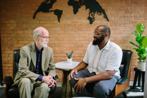 A faculty supervisor and a counselor-in-training in conversation
