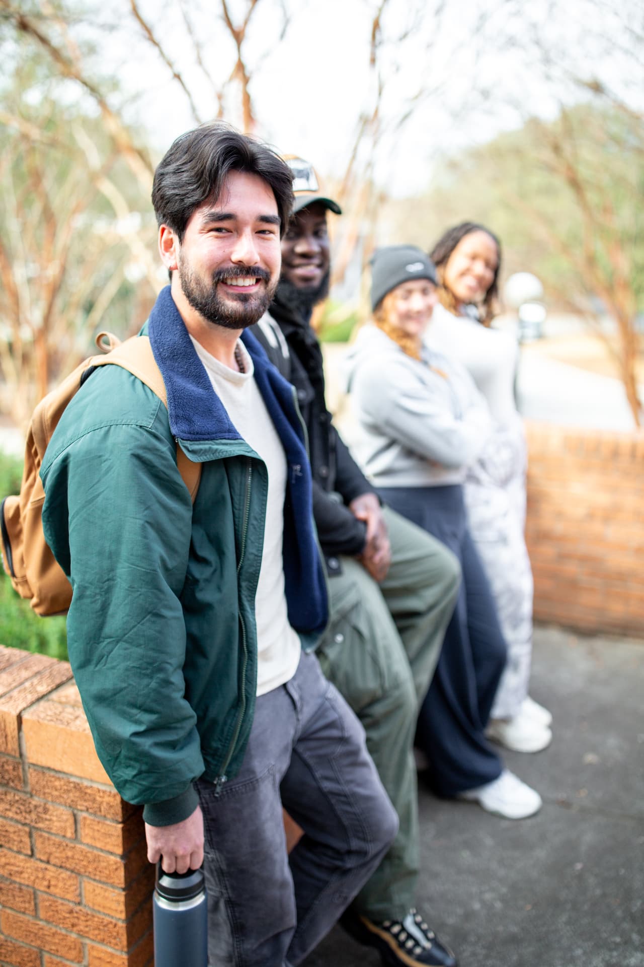 A group of Columbia International University students gathered together on campus, representing community and connection